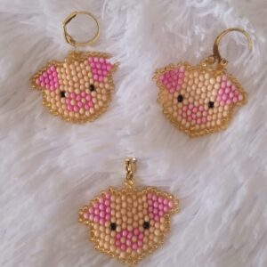 Set aretes y dije de marrano
